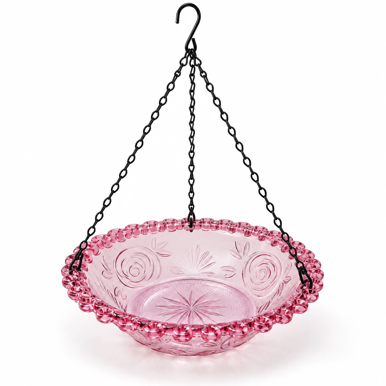 Coupelle rose suspendue sur fond blanc
