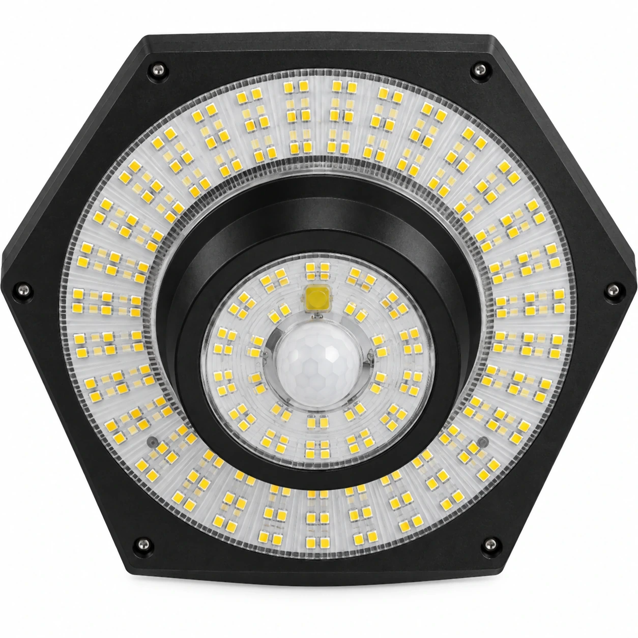 Face inférieure de près : trois couronnes de LED jaunes autour du dôme du détecteur de mouvement